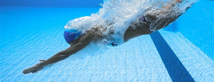 Person-diving-into-swimming-pool